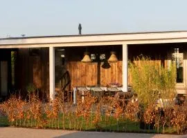 Hip huisje aan de Maas