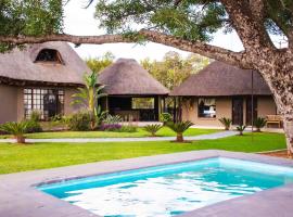 Sasavona Game Lodge, cabin in Warmbaths