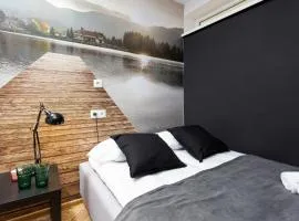 Affordable Underground Micro Apartment Grochowska by Noclegi Renters