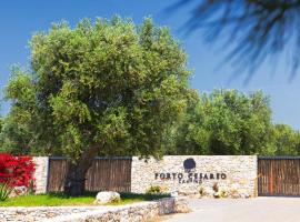 Happy Camp mobile homes in Porto Cesareo Camping, glampingplads i Porto Cesareo