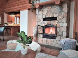 Log cabin with HOT TUB and view, hotell med parkering i La Minerve