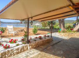 Wonderful stone house infront of the sea., hotel in Ladharió