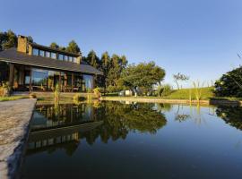 Casa con gran jardín y piscina en Cabarceno, cheap hotel in Villanueva