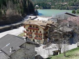 Casa NeveXenne & La Casa di Blek, hotel ad Alleghe