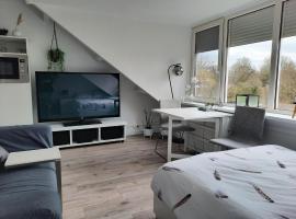 Studio 76 Groningen met gratis leenfietsen, habitación en casa particular en Groninga