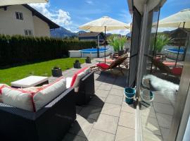 Modernes Alpenapartment mit Sauna Wintergarten und Pool, hotel económico en Salzburgo