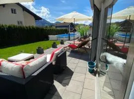 Modernes Alpenapartment mit Sauna Wintergarten und Pool