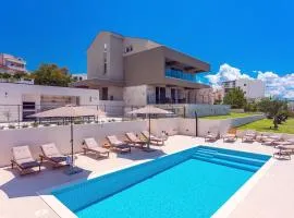 Villa Diva with 7 bedrooms, heated pool, sauna and fun zone, sea views