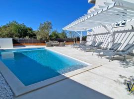 Apartment PASMAN - appartement 50 m2 et piscine, Hotel in Pakoštane