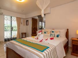 Janes' Serenity Guesthouse, hotel cerca de Kot Man-Ya Exotic Flower Garden, Anse a La Mouche