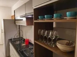 Apartamento novo , poucos metros da praia com WI FI