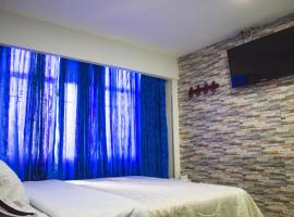 Hotel Punto 100 โรงแรมใกล้สนามบินนานาชาติเอลโดราโด - BOGในโบโกตา