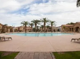 Gated townhouse with 2 suites, heated pool, hot tub