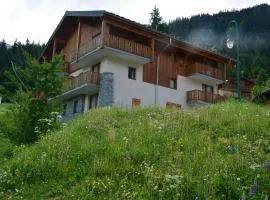 Vacancéole - Résidence Les Chalets de la Ramoure