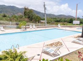 Apartment in Villas Del Faro Resort with WIFI, отель в городе Маунабо