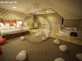 ARSİSA HOTEL SUİTE SPA، فندق في أفجيلار
