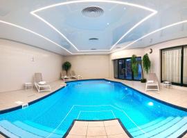 Hotel Amaryllis, ξενοδοχείο σε Swarzedz