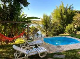 Casa com piscina fundo pra represa e AR Condicionado CasinhaBrancaDeVaranda