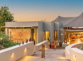 Ndhula Luxury Tented Lodge, отель в городе Уайт-Ривер