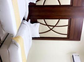 الركن الهادي للاجنحة الفندقية – hotel w mieście ‘Aţf