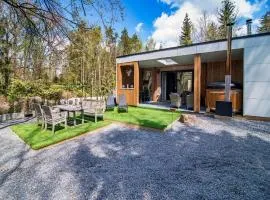 Nice holiday home in Biron with barrel sauna and hot tub