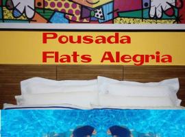 Pousada Flats Alegria, guest house in Olímpia