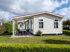 Luxe 5-persoons chalet op familiecamping – domek wiejski w mieście Baarland