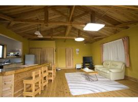 Log house for 12 people - Vacation STAY 35063v، فندق مع موقف سيارات في ميناميوغوني