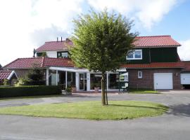 Familienurlaub in Ostfriesland für max 7 Pers in 2 Wohnungen, auch Einzeln Wohnungen, parkimisega hotell sihtkohas Utarp