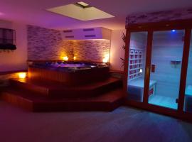 Suite room jacuzzi sauna privatif illimité Clisson, hotel con spa en Clisson