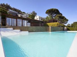 Apartamento con piscina y excelentes vistas, būstas prie paplūdimio mieste Ferolis
