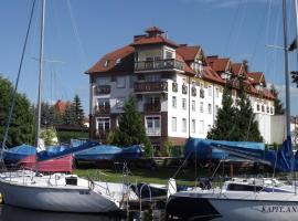 Prywatne apartamenty z widokiem na Port lub Zamek Krzyżacki, Hotel in Angerburg