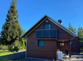 Agréable chalet Au milieu des sapins, chalet de montaña en La Plaine des Cafres