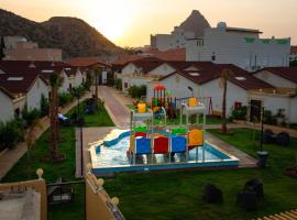 منتجع جزيرة الروز بالهدا, apartament cu servicii hoteliere din Al Qubsah