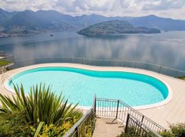 La villetta in residence con piscina e vista lago、Parzanicaのホテル