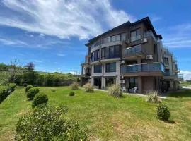 Seaview dreamy apartment with a pool and garden