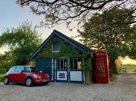 Holiday cottage de Garage Inn, hotel dicht bij: Golfbaan Hank, Hank