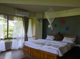 Capital O 79978 Rustic Charm Wayanad, hotel v destinaci Chegāt