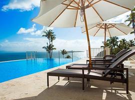 Apto. 3h/X-201/Vista Mare/Caribbean Tourist Rental: Sánchez'de bir otel