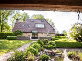Bosvilla Landgoed Lindehof, cottage in Blesdijke