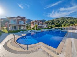 Golden Golf Sarıgerme Villaları, strandhotell i Sarigerme