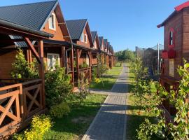 Pod Dębami Wicie- domki drewniane nad morzem, hotel em Wicie