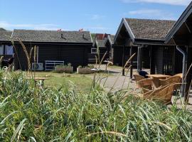 Fjand Badeby - Guesthouse, Cottages and Colony เกสต์เฮาส์ในUlfborg