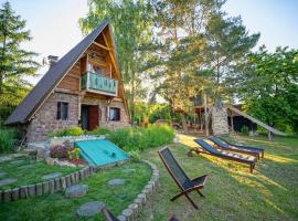 Privāta brīvdienu naktsmītne Rustic cottage JARILO, an oasis of peace in nature pilsētā Ležimir