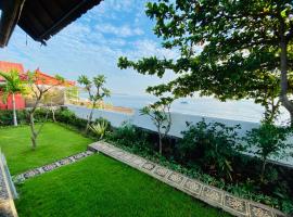 Solaluna Beach Homestay, guest house in Amed
