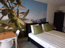 Os Mundos, bed and breakfast en Deurne