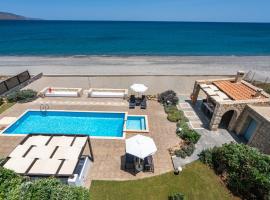 Beachfront villa Turquoise with private pool, BBQ and ping pong table, family hotel in Chania