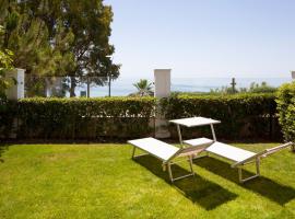 Frontline Beach ground floor apartment with private garden, Doncella Beach.