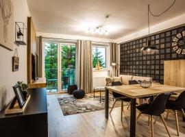 Aparthotel Klínovec Views, hotel di Loučná pod Klínovcem