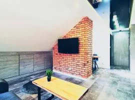 Loftowy Apartament w centrum Mikołajek